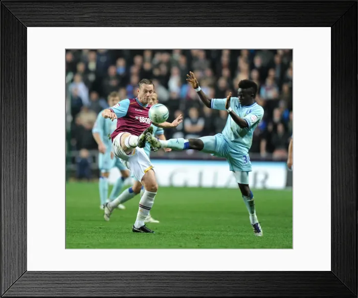 Framed Print : Big Clash: Bigirimana vs. Nolan in Coventry City vs. West Ham United Npower Championship Showdown Framed Print : Big Clash: Bigirimana vs. Nolan in Coventry City vs. West Ham United Npower Championship Showdown