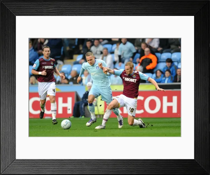 Framed Print : Battle for the Ball: Hussey vs. Collison - Coventry City vs. West Ham United, Championship Showdown (19-11-2011) Framed Print : Battle for the Ball: Hussey vs. Collison - Coventry City vs. West Ham United, Championship Showdown (19-11-2011)