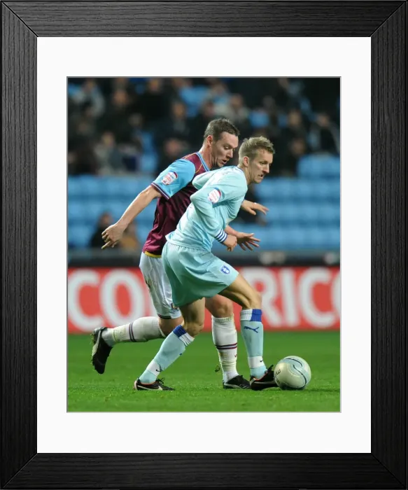 Framed Print : Carl Baker Avoids Glance: Tense Moment between Coventry City's Baker and West Ham's Nolan (Npower Championship, 19-11-2011, Ricoh Arena) Framed Print : Carl Baker Avoids Glance: Tense Moment between Coventry City's Baker and West Ham's Nolan (Npower Championship, 19-11-2011, Ricoh Arena)