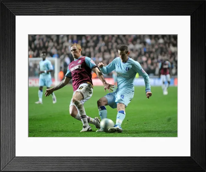 Framed Print : Battle for the Ball: Jutkiewicz vs. Collison - Coventry City vs. West Ham United, Npower Championship (2011) Framed Print : Battle for the Ball: Jutkiewicz vs. Collison - Coventry City vs. West Ham United, Npower Championship (2011)