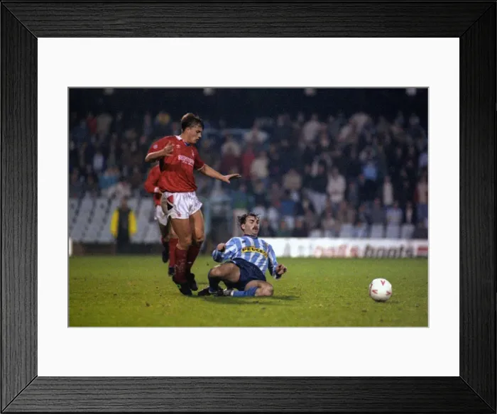 Framed Print : Intense Battle: Mickey Gynn vs. Carl Tiler - Coventry City vs. Nottingham Forest in the Rumbelows Cup Fourth Round (November 1990) Framed Print : Intense Battle: Mickey Gynn vs. Carl Tiler - Coventry City vs. Nottingham Forest in the Rumbelows Cup Fourth Round (November 1990)