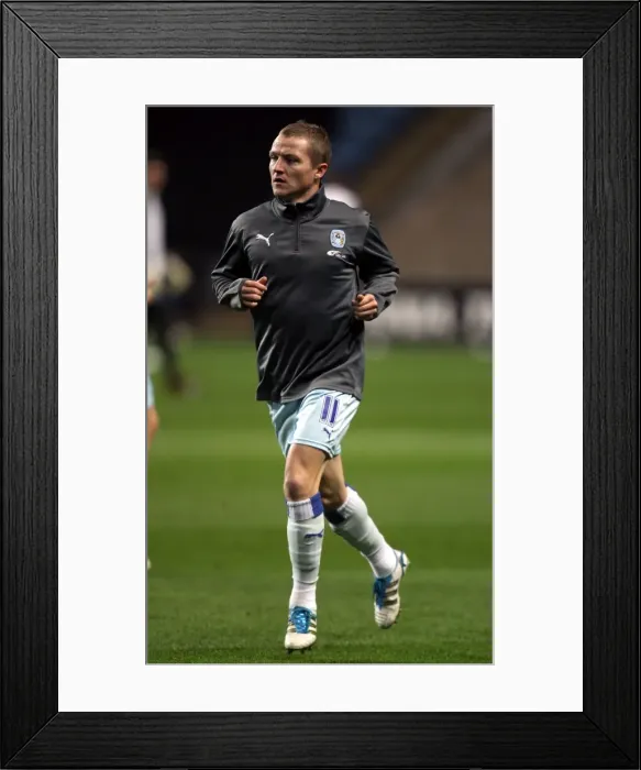 Framed Print : Gary McSheffrey in Focus: Warming Up Ahead of Coventry City vs. Cardiff City (Npower Championship, 22-11-2011, Ricoh Arena)