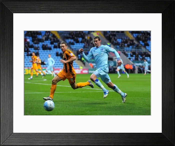 Framed Print : Battle for the Ball: Jutkiewicz vs. Chester - Coventry City vs. Hull City, Npower Championship (10-12-2011) Framed Print : Battle for the Ball: Jutkiewicz vs. Chester - Coventry City vs. Hull City, Npower Championship (10-12-2011)