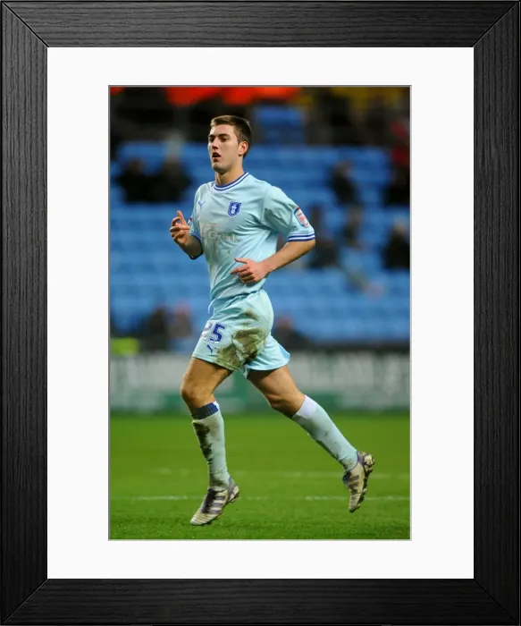 Framed Print : Gary Gardner vs Hull City: Npower Championship Showdown at Ricoh Arena (10-12-2011)