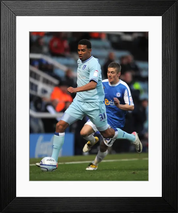 Framed Print : Cyrus Christie Evas Action: Coventry City vs. Peterborough United in Npower Championship Framed Print : Cyrus Christie Evas Action: Coventry City vs. Peterborough United in Npower Championship