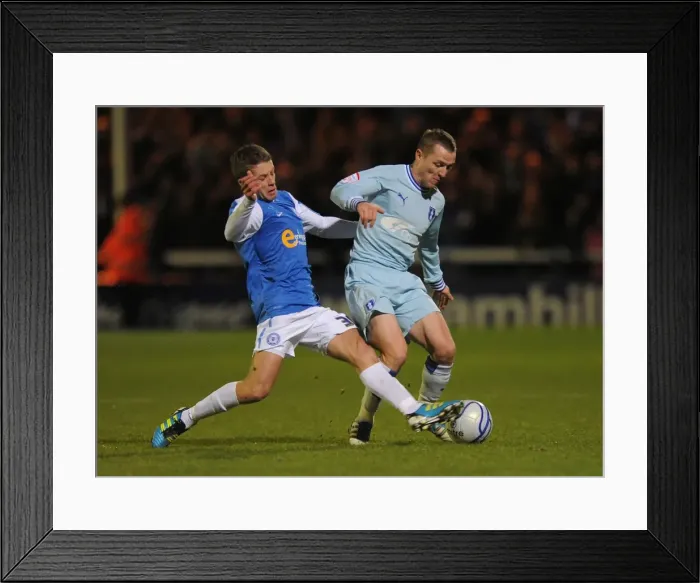 Framed Print : Intense Rivalry: McSheffrey vs. Kennedy's Battle for Ball Possession in Coventry City vs. Peterborough United (December 17, 2011, London Road) Framed Print : Intense Rivalry: McSheffrey vs. Kennedy's Battle for Ball Possession in Coventry City vs. Peterborough United (December 17, 2011, London Road)