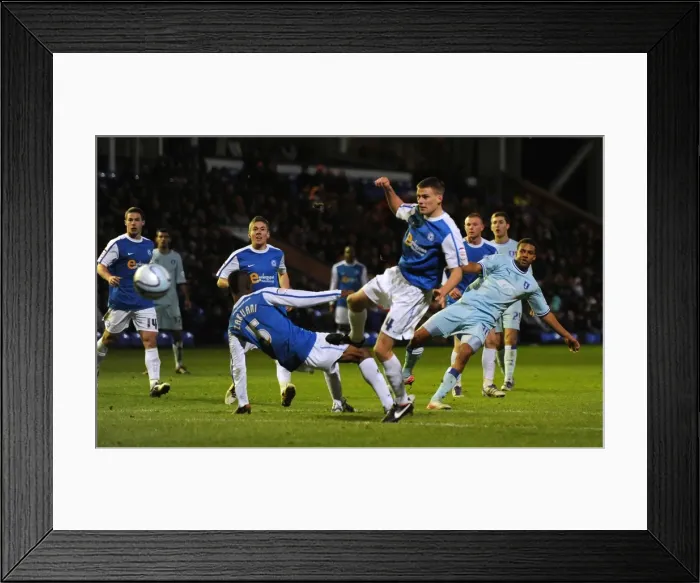 Framed Print : Cyrus Christie's Thunderous Goal Attempt vs. Peterborough United (17-12-2011) Framed Print : Cyrus Christie's Thunderous Goal Attempt vs. Peterborough United (17-12-2011)