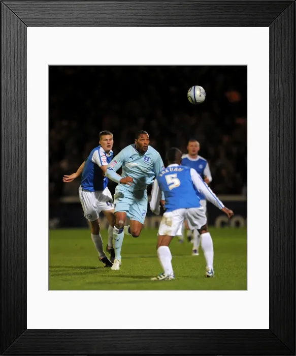 Framed Print : Clive Platt Charges Forward: Coventry City vs. Peterborough United in Npower Championship Action Framed Print : Clive Platt Charges Forward: Coventry City vs. Peterborough United in Npower Championship Action