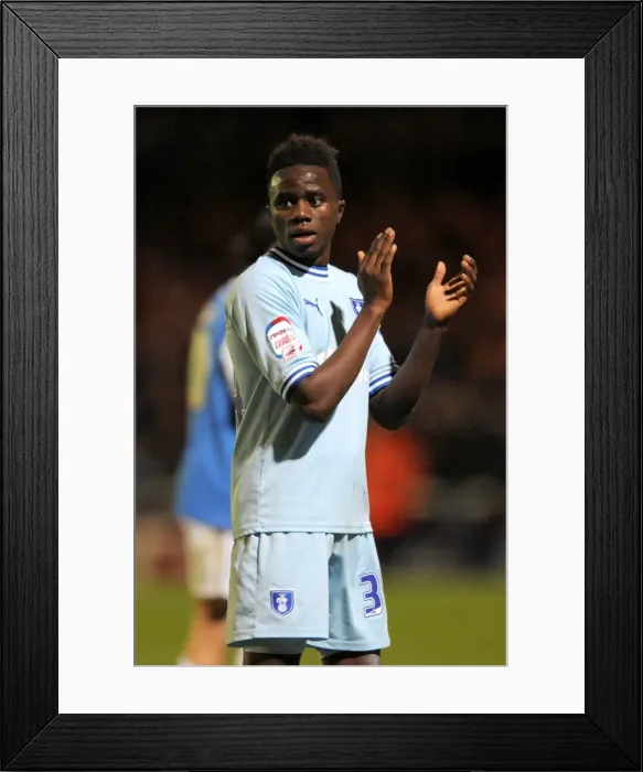 Framed Print : Gael Bigirimana in Action: Coventry City vs. Peterborough United, Npower Championship (December 2011) Framed Print : Gael Bigirimana in Action: Coventry City vs. Peterborough United, Npower Championship (December 2011)
