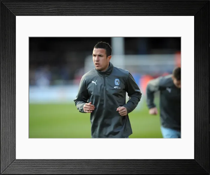 Framed Print : Richard Wood of Coventry City FC in Action Against Peterborough United (17-12-2011, London Road)