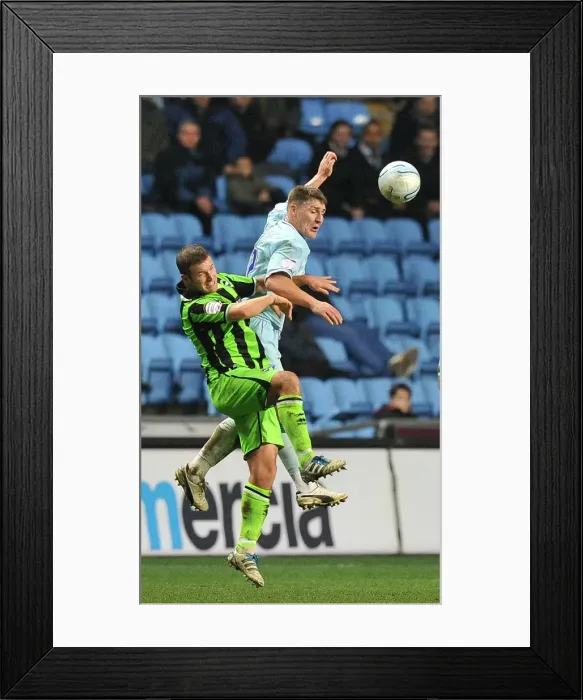 Framed Print : Clash at Ricoh Arena: Footballers Leap for the Ball - Coventry City vs. Brighton & Hove Albion Framed Print : Clash at Ricoh Arena: Footballers Leap for the Ball - Coventry City vs. Brighton & Hove Albion