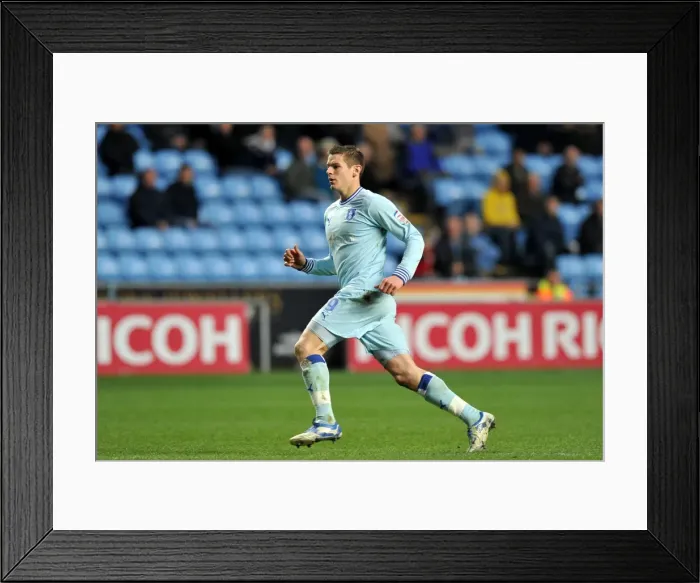 Framed Print : Lukas Jutkiewicz vs Brighton & Hove Albion: Npower Championship Showdown at Ricoh Arena (December 31, 2011)
