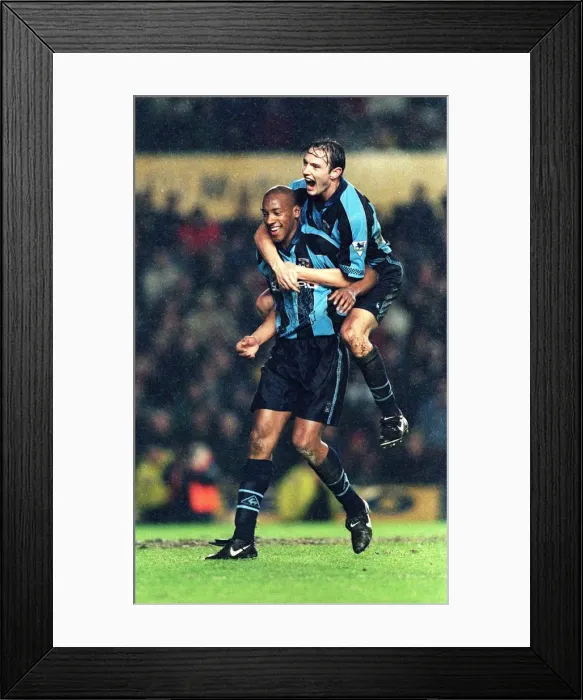 Framed Print : Coventry City's Double Victory: Noel Whelan and Dion Dublin Celebrate 3-2 FA Premiership Win Over Manchester United Framed Print : Coventry City's Double Victory: Noel Whelan and Dion Dublin Celebrate 3-2 FA Premiership Win Over Manchester United