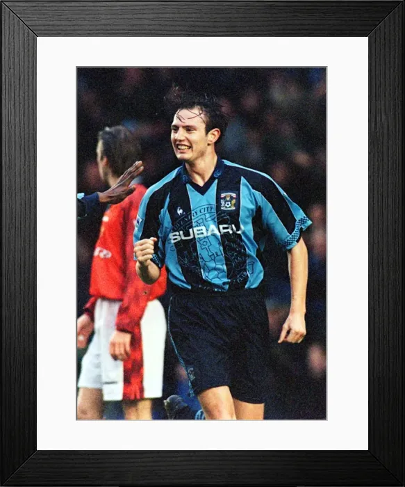 Framed Print : Noel Whelan Scores the Opener Against Manchester United in FA Premiership Framed Print : Noel Whelan Scores the Opener Against Manchester United in FA Premiership