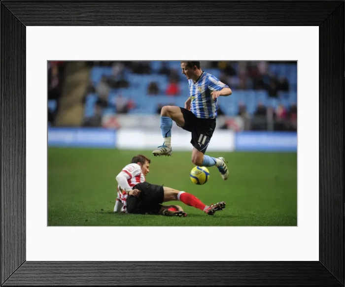 Framed Print : Gary McSheffrey vs. Dean Hammond: FA Cup Third Round Showdown at Coventry City's Ricoh Arena (07-01-2012 v Southampton) Framed Print : Gary McSheffrey vs. Dean Hammond: FA Cup Third Round Showdown at Coventry City's Ricoh Arena (07-01-2012 v Southampton)
