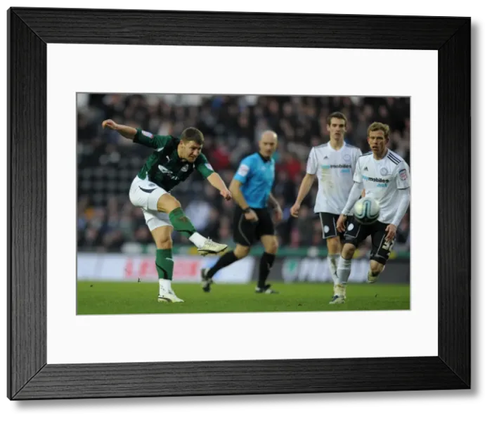 Framed Print : Gary Deegan's Determined Shot at Pride Park: Coventry City vs. Derby County, Npower Championship (01-14-2012) Framed Print : Gary Deegan's Determined Shot at Pride Park: Coventry City vs. Derby County, Npower Championship (01-14-2012)