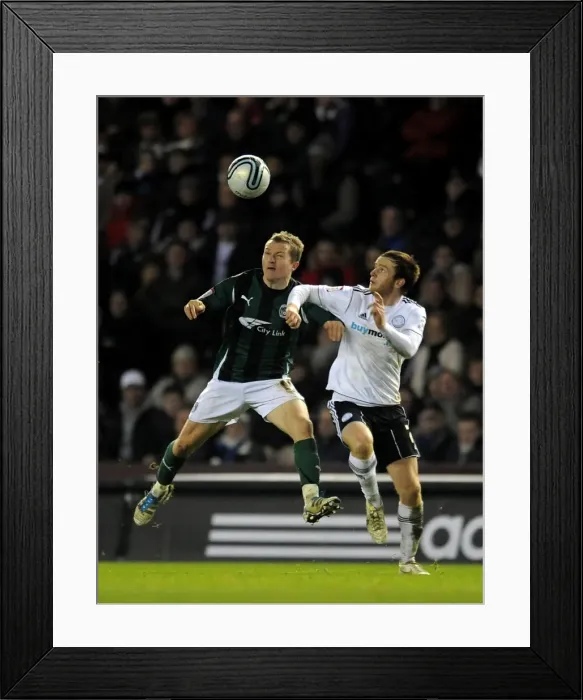 Framed Print : Battle for the Ball: McSheffrey vs. Brayford in Coventry City's Championship Showdown at Derby County Framed Print : Battle for the Ball: McSheffrey vs. Brayford in Coventry City's Championship Showdown at Derby County