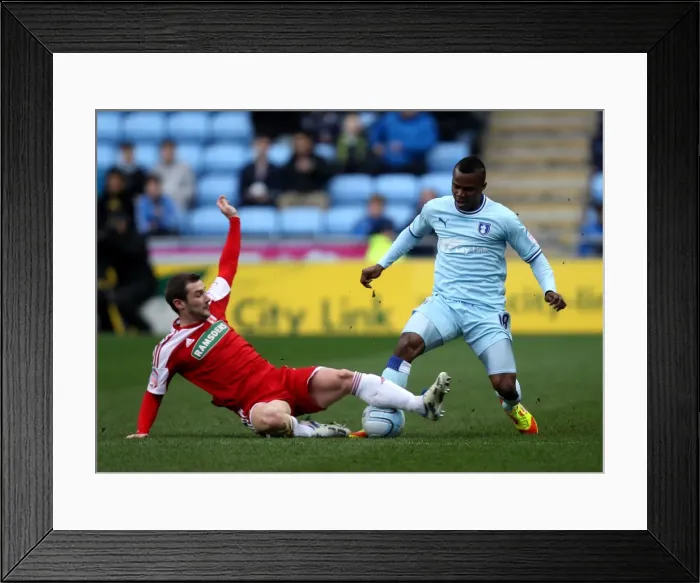 Framed Print : A Tackle in the Npower Championship: Coventry City's Alex Nimely vs Middlesbrough's Kevin Thomson (21-01-2012, Ricoh Arena) Framed Print : A Tackle in the Npower Championship: Coventry City's Alex Nimely vs Middlesbrough's Kevin Thomson (21-01-2012, Ricoh Arena)