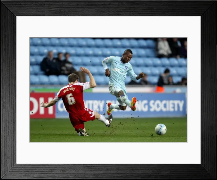 Framed Print : Battle for the Ball: Alex Nimely vs. Stephen McManus (Coventry City vs. Middlesbrough, 21-01-2012) Framed Print : Battle for the Ball: Alex Nimely vs. Stephen McManus (Coventry City vs. Middlesbrough, 21-01-2012)