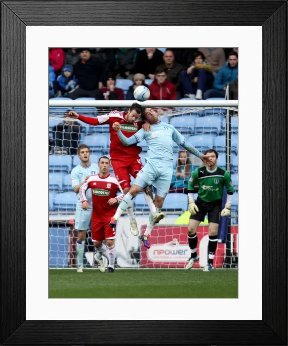 Framed Print : Richard Keogh and Middlesbroughs Matthew Bates battle for the ball Framed Print : Richard Keogh and Middlesbroughs Matthew Bates battle for the ball