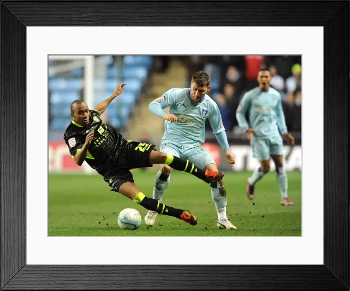 Framed Print : Intense Rivalry: Fabian Delph vs. Gary Deegan Clash in Coventry City vs. Leeds United Championship Match (14-02-2012, Ricoh Arena) Framed Print : Intense Rivalry: Fabian Delph vs. Gary Deegan Clash in Coventry City vs. Leeds United Championship Match (14-02-2012, Ricoh Arena)