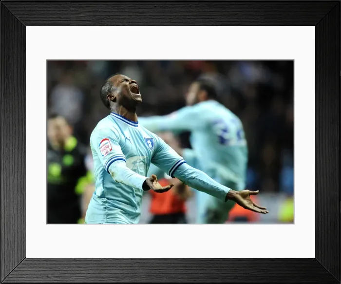 Framed Print : Coventry City FC's Championship Victory: Alex Nimely's Euphoric Moment (14-02-2012) Framed Print : Coventry City FC's Championship Victory: Alex Nimely's Euphoric Moment (14-02-2012)