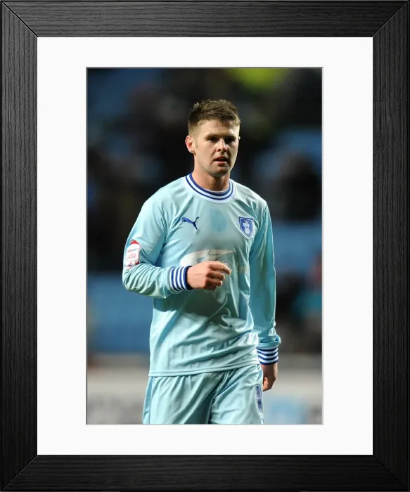 Framed Print : Oliver Norwood vs Leeds United: Intense Face-Off in Coventry City's Championship Clash (14-02-2012) Framed Print : Oliver Norwood vs Leeds United: Intense Face-Off in Coventry City's Championship Clash (14-02-2012)