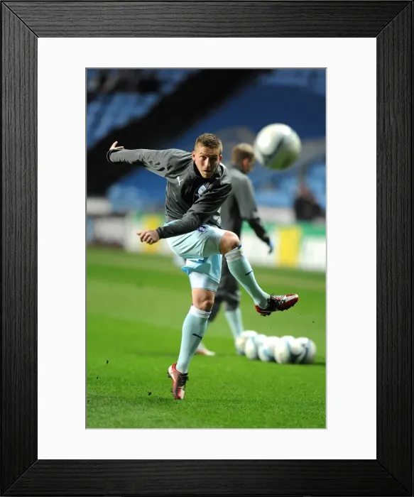 Framed Print : Freddy Eastwood Scores the Game-Winning Goal Against Leeds United at Ricoh Arena (14-02-2012)