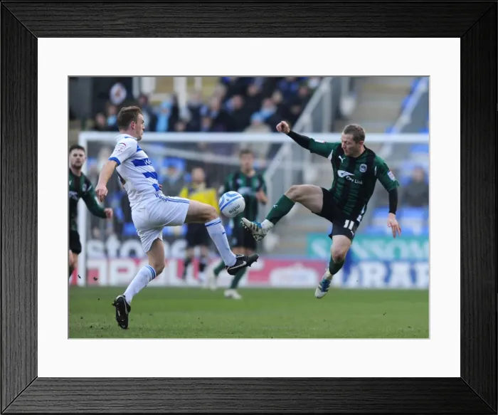 Framed Print : Battle for the Ball: Pearce vs. McSheffrey in the Npower Championship Clash between Coventry City and Reading (11-02-2012) Framed Print : Battle for the Ball: Pearce vs. McSheffrey in the Npower Championship Clash between Coventry City and Reading (11-02-2012)