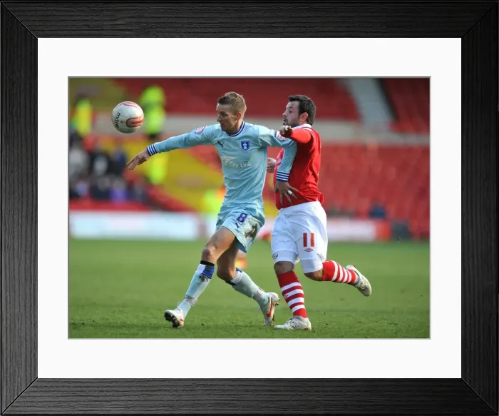 Framed Print : Battling for Championship Supremacy: Reid vs. Baker, Nottingham Forest vs. Coventry City (February 18, 2012) Framed Print : Battling for Championship Supremacy: Reid vs. Baker, Nottingham Forest vs. Coventry City (February 18, 2012)
