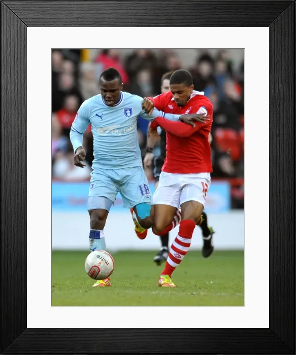 Framed Print : Battle for the Ball: Nimely vs McCleary in Nottingham Forest vs Coventry City Championship Clash (18-02-2012) Framed Print : Battle for the Ball: Nimely vs McCleary in Nottingham Forest vs Coventry City Championship Clash (18-02-2012)