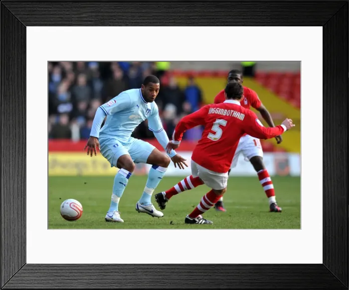 Framed Print : Intense Rivalry: Clive Platt vs. Danny Higginbotham's Battle for Supremacy in Coventry City vs. Nottingham Forest, Npower Championship (18-02-2012, City Ground) Framed Print : Intense Rivalry: Clive Platt vs. Danny Higginbotham's Battle for Supremacy in Coventry City vs. Nottingham Forest, Npower Championship (18-02-2012, City Ground)