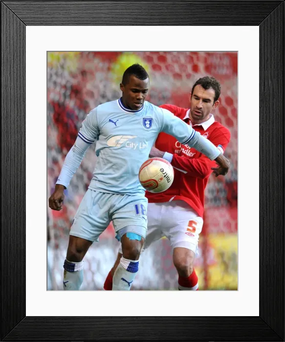 Framed Print : Battle for the Ball: Alex Nimely vs. Danny Higginbotham - Coventry City vs. Nottingham Forest, Npower Championship (2012) Framed Print : Battle for the Ball: Alex Nimely vs. Danny Higginbotham - Coventry City vs. Nottingham Forest, Npower Championship (2012)