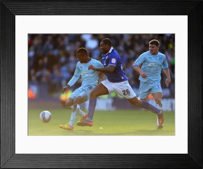 Framed Print : Intense Rivalry: Wes Morgan vs. Alex Nimely at The King Power Stadium - Coventry City vs. Leicester City, Football League Championship (03-03-2012) Framed Print : Intense Rivalry: Wes Morgan vs. Alex Nimely at The King Power Stadium - Coventry City vs. Leicester City, Football League Championship (03-03-2012)