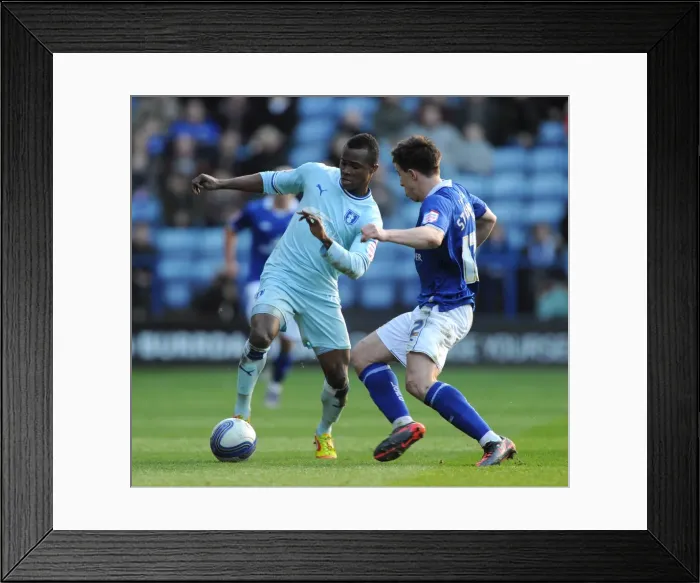 Framed Print : Championship Showdown: St Ledger vs Nimely - A Rivalry at The King Power Stadium (March 2012) Framed Print : Championship Showdown: St Ledger vs Nimely - A Rivalry at The King Power Stadium (March 2012)