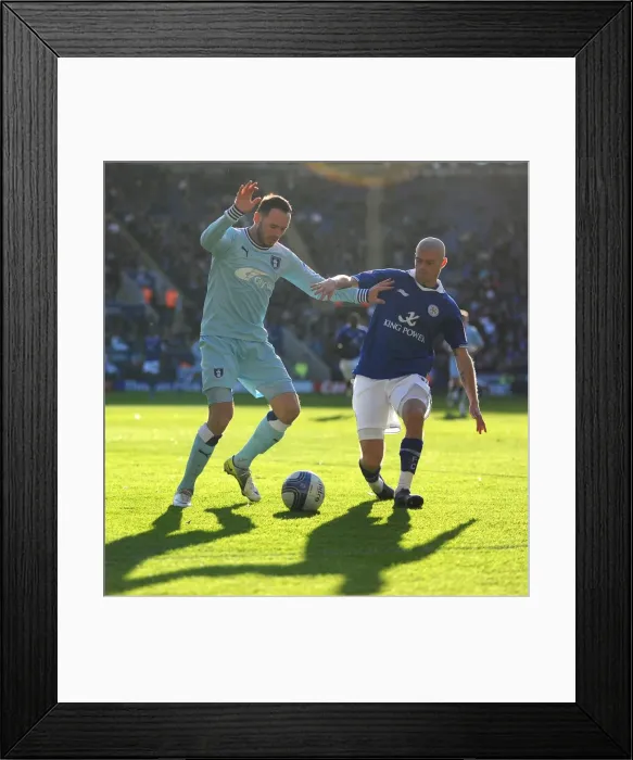 Framed Print : Championship Showdown: Konchesky vs Bell at The King Power Stadium (March 3, 2012) - A Clash of Football Titans Framed Print : Championship Showdown: Konchesky vs Bell at The King Power Stadium (March 3, 2012) - A Clash of Football Titans