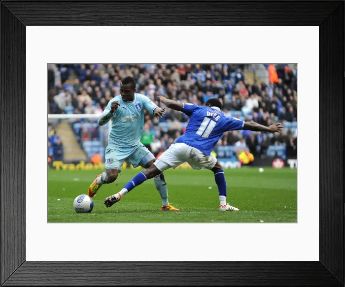 Framed Print : Clash of the Titans: Lloyd Dyer vs Alex Nimely in the Intense Npower Championship Showdown at The King Power Stadium (March 3, 2012) Framed Print : Clash of the Titans: Lloyd Dyer vs Alex Nimely in the Intense Npower Championship Showdown at The King Power Stadium (March 3, 2012)