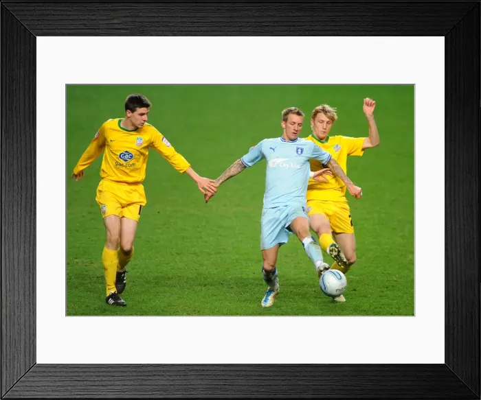 Framed Print : Intense Rivalry: Baker vs Garvan & Moxey in Coventry City vs Crystal Palace Npower Championship Clash (06-03-2012, Ricoh Arena)