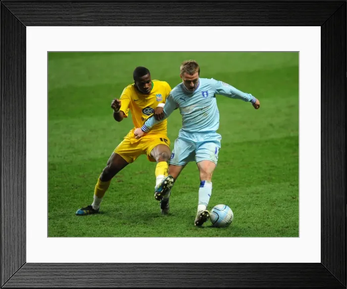 Framed Print : Clash at Ricoh Arena: Wilfried Zaha vs. Gary McSheffrey - Npower Championship Showdown Framed Print : Clash at Ricoh Arena: Wilfried Zaha vs. Gary McSheffrey - Npower Championship Showdown