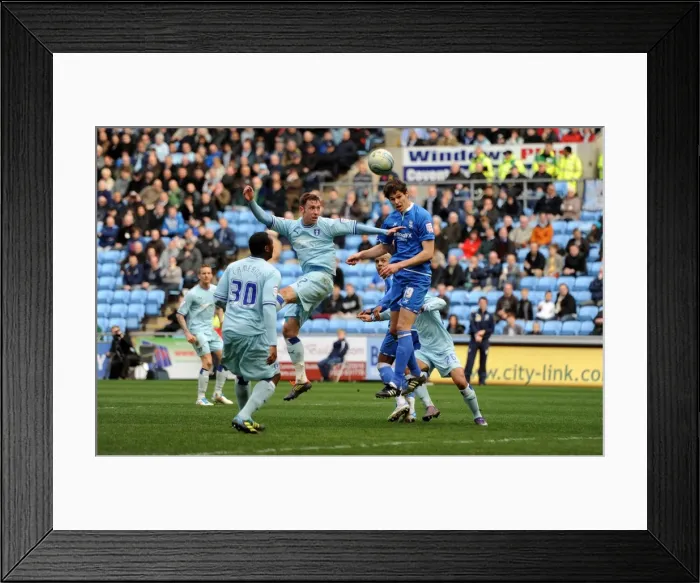 Framed Print : Battling for Championship Supremacy: Zigic vs. Keogh at Ricoh Arena Framed Print : Battling for Championship Supremacy: Zigic vs. Keogh at Ricoh Arena