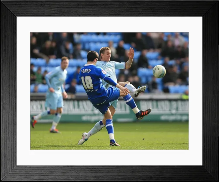 Framed Print : Clash of the Midfield Maestros: Carl Baker vs. Keith Fahey (10-03-2012, Coventry City vs. Birmingham City) Framed Print : Clash of the Midfield Maestros: Carl Baker vs. Keith Fahey (10-03-2012, Coventry City vs. Birmingham City)