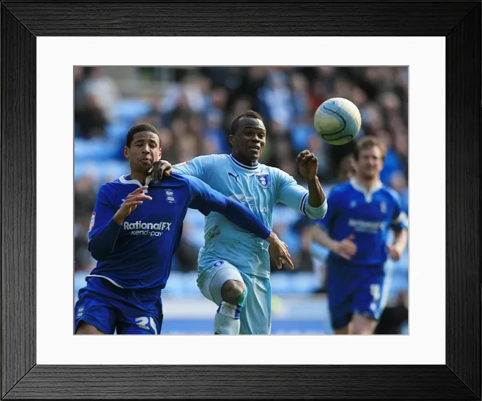 Framed Print : Clash at Ricoh Arena: Alex Nimely vs. Curtis Davis - Coventry City vs. Birmingham City (Npower Championship, 10-03-2012) Framed Print : Clash at Ricoh Arena: Alex Nimely vs. Curtis Davis - Coventry City vs. Birmingham City (Npower Championship, 10-03-2012)