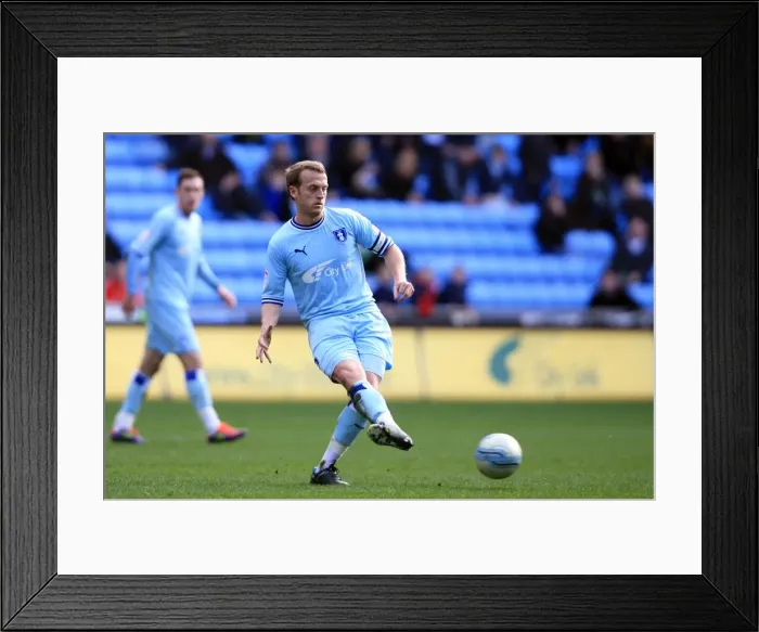 Framed Print : Sammy Clingan Faces Off Against Birmingham City in Npower Championship Clash at Ricoh Arena (10-03-2012) Framed Print : Sammy Clingan Faces Off Against Birmingham City in Npower Championship Clash at Ricoh Arena (10-03-2012)