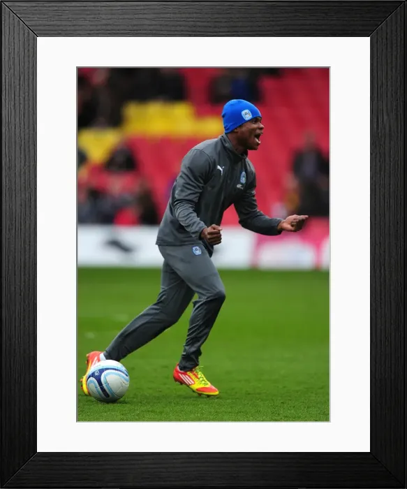 Framed Print : Coventry City's Alex Nimely: Uncontainable Excitement During Warm-Up Ahead of Watford Clash (Npower Championship, 17-03-2012) Framed Print : Coventry City's Alex Nimely: Uncontainable Excitement During Warm-Up Ahead of Watford Clash (Npower Championship, 17-03-2012)