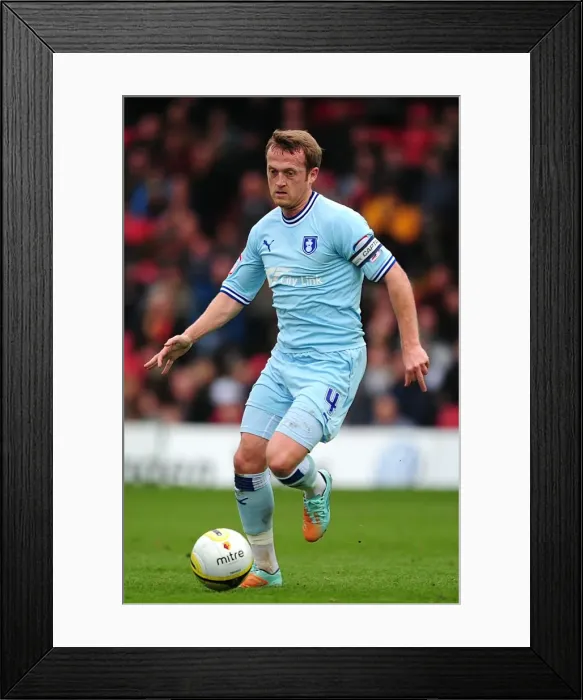 Framed Print : Sammy Clingan of Coventry City in Action against Watford (17-03-2012, Vicarage Road) Framed Print : Sammy Clingan of Coventry City in Action against Watford (17-03-2012, Vicarage Road)