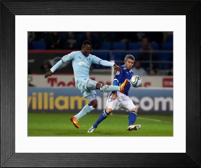 Framed Print : Battle for Possession: Coventry City vs. Cardiff City, Npower Championship - Alex Nimley vs. Kevin McNaughton Framed Print : Battle for Possession: Coventry City vs. Cardiff City, Npower Championship - Alex Nimley vs. Kevin McNaughton