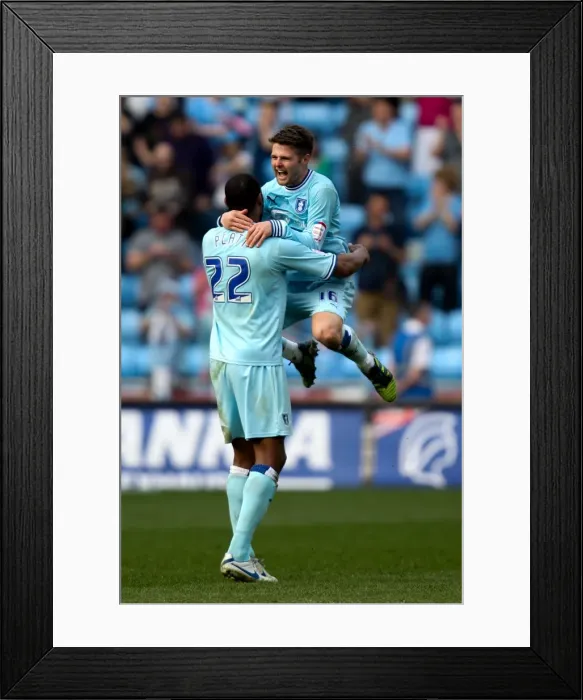 Framed Print : Coventry City FC: Oliver Norwood and Clive Platt's Championship-Winning Moment with Portsmouth (24-03-2012, Ricoh Arena) Framed Print : Coventry City FC: Oliver Norwood and Clive Platt's Championship-Winning Moment with Portsmouth (24-03-2012, Ricoh Arena)