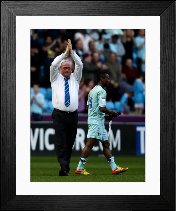 Framed Print : Andy Thorn's Coventry City: Unity with Fans Amidst Npower Championship Battle - Coventry City vs Portsmouth (24-03-2012, Ricoh Arena): Manager's Heartfelt Applause to Supporters Framed Print : Andy Thorn's Coventry City: Unity with Fans Amidst Npower Championship Battle - Coventry City vs Portsmouth (24-03-2012, Ricoh Arena): Manager's Heartfelt Applause to Supporters