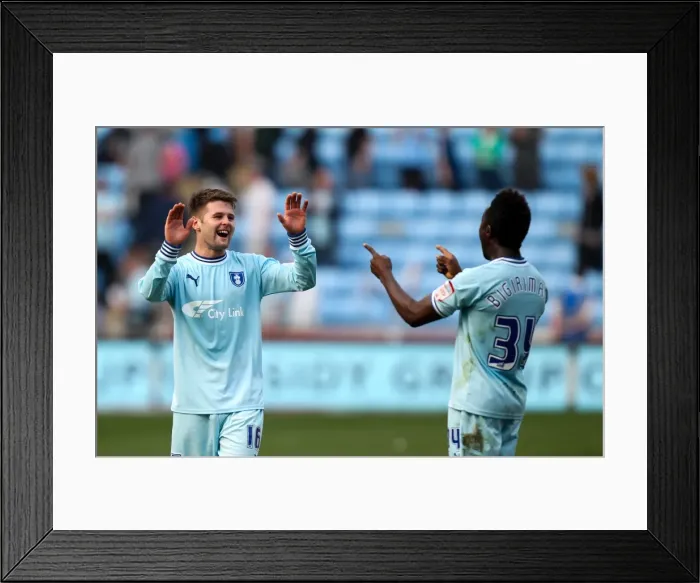 Framed Print : Coventry City FC: Oliver Norwood and Gael Bigirimana's Championship-Winning Celebration vs. Portsmouth (2012) Framed Print : Coventry City FC: Oliver Norwood and Gael Bigirimana's Championship-Winning Celebration vs. Portsmouth (2012)