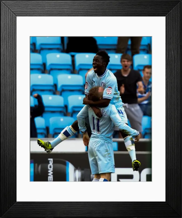 Framed Print : Coventry City FC: Bigirimana and McSheffrey Celebrate Opening Goal Against Portsmouth (Npower Championship, 24-03-2012, Ricoh Arena) Framed Print : Coventry City FC: Bigirimana and McSheffrey Celebrate Opening Goal Against Portsmouth (Npower Championship, 24-03-2012, Ricoh Arena)